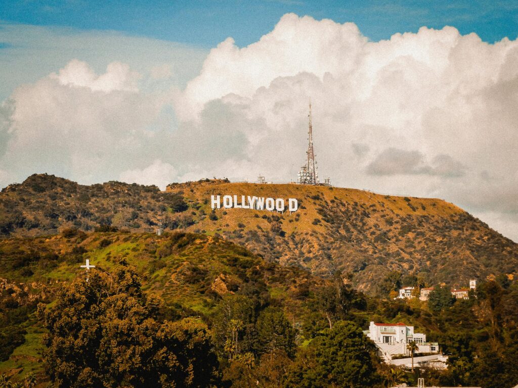 A scenic view of the famous Hollywood Sign on a sunny day in Los Angeles.